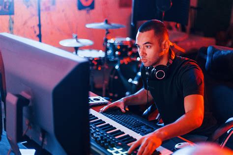 How Much Does a Music Producer Make? And Why Do They Always Wear Headphones Indoors?